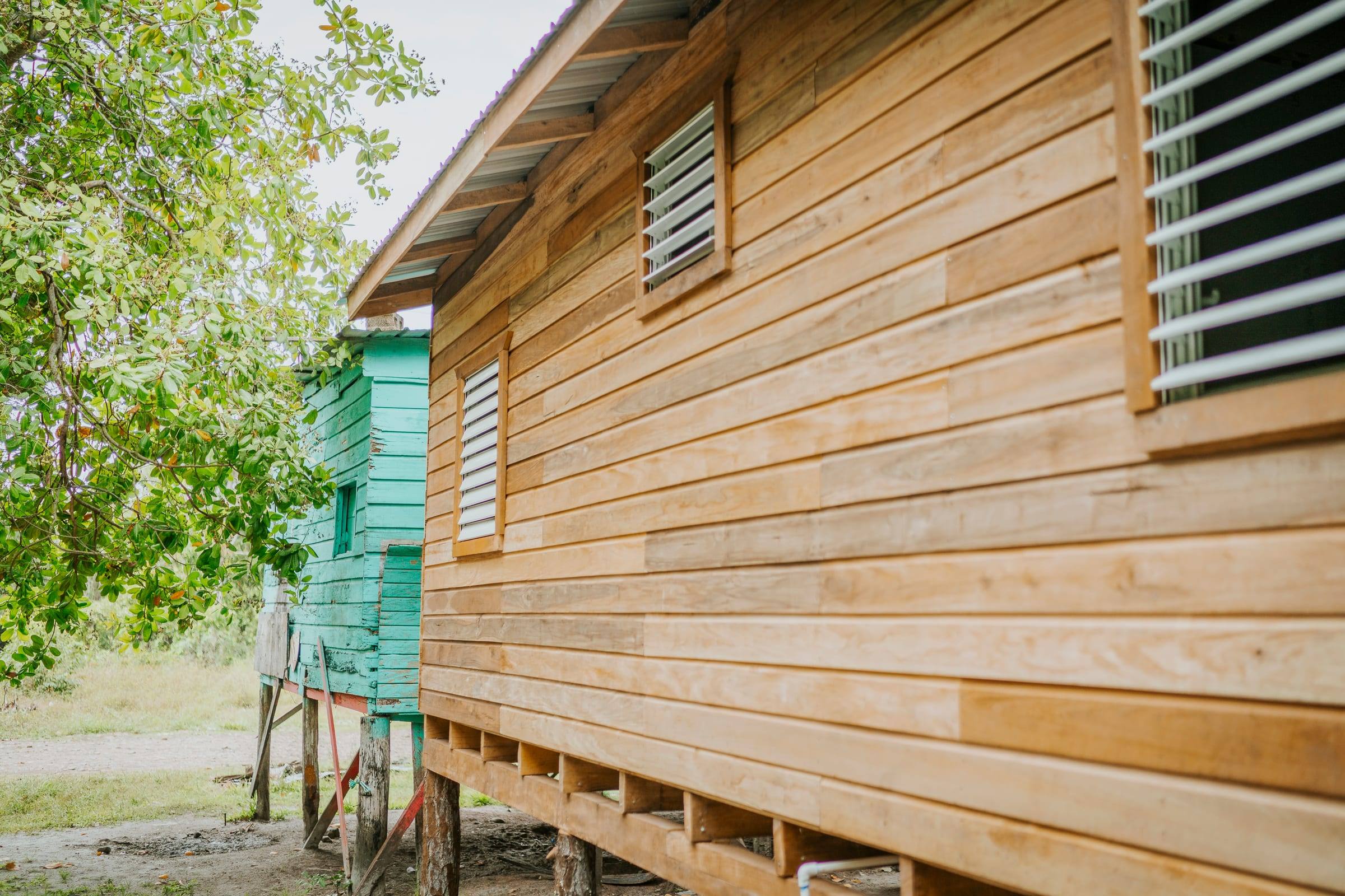 A newly built wooden home raised on stilts